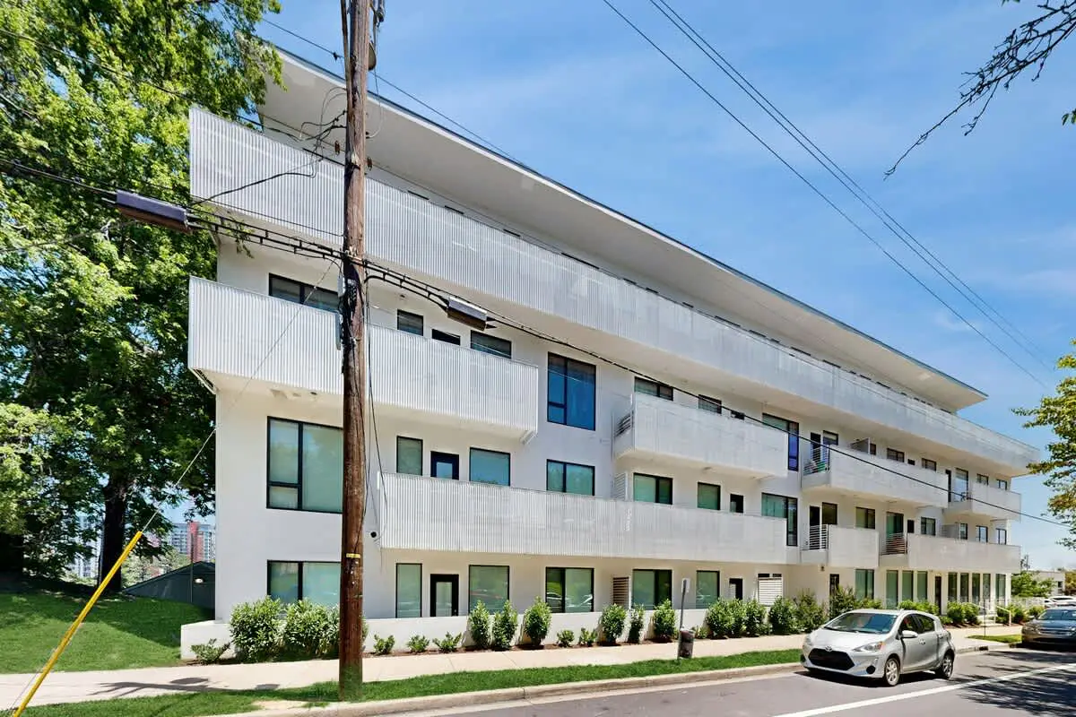 Chic Corner Condo with Balcony, Central AC, W/D, Seasonal Pool, & Gym