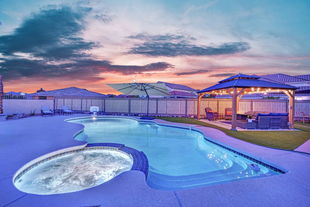 Experience luxury in Henderson with The Gold Standard, a spacious 4-bedroom home!