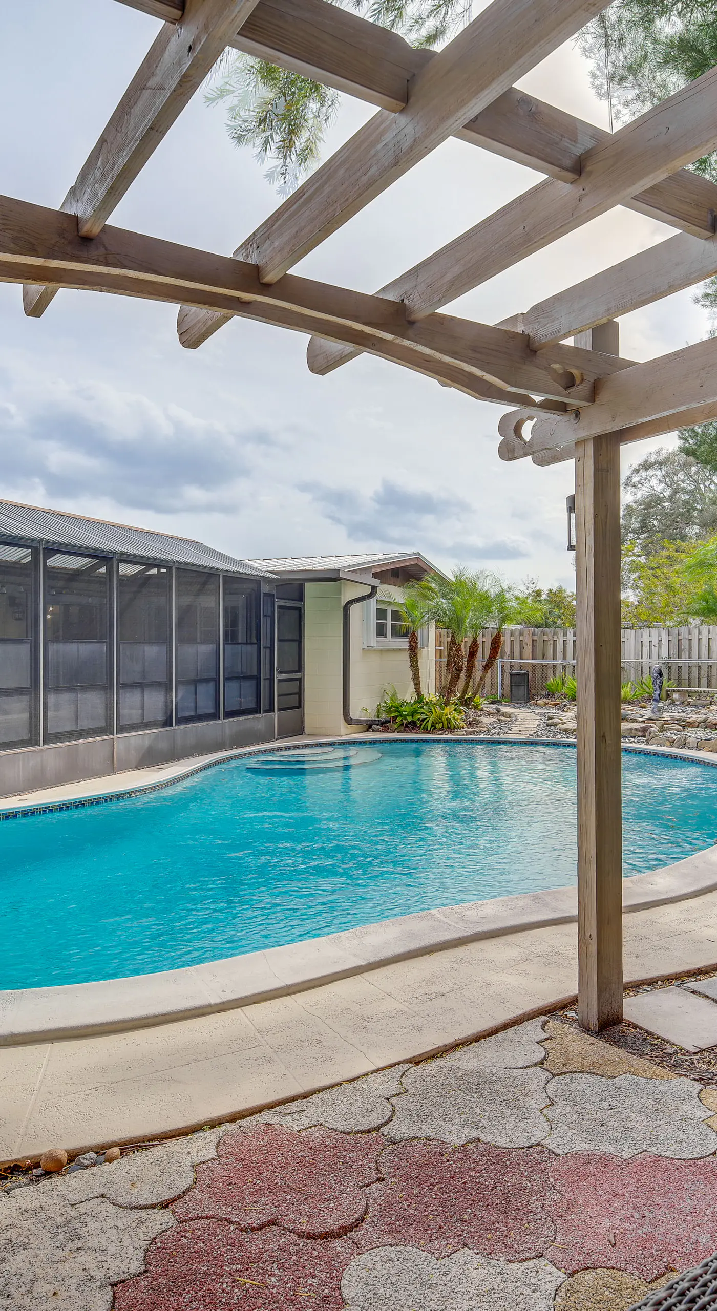 Centrally Located Merritt Island Home: Pool, Porch