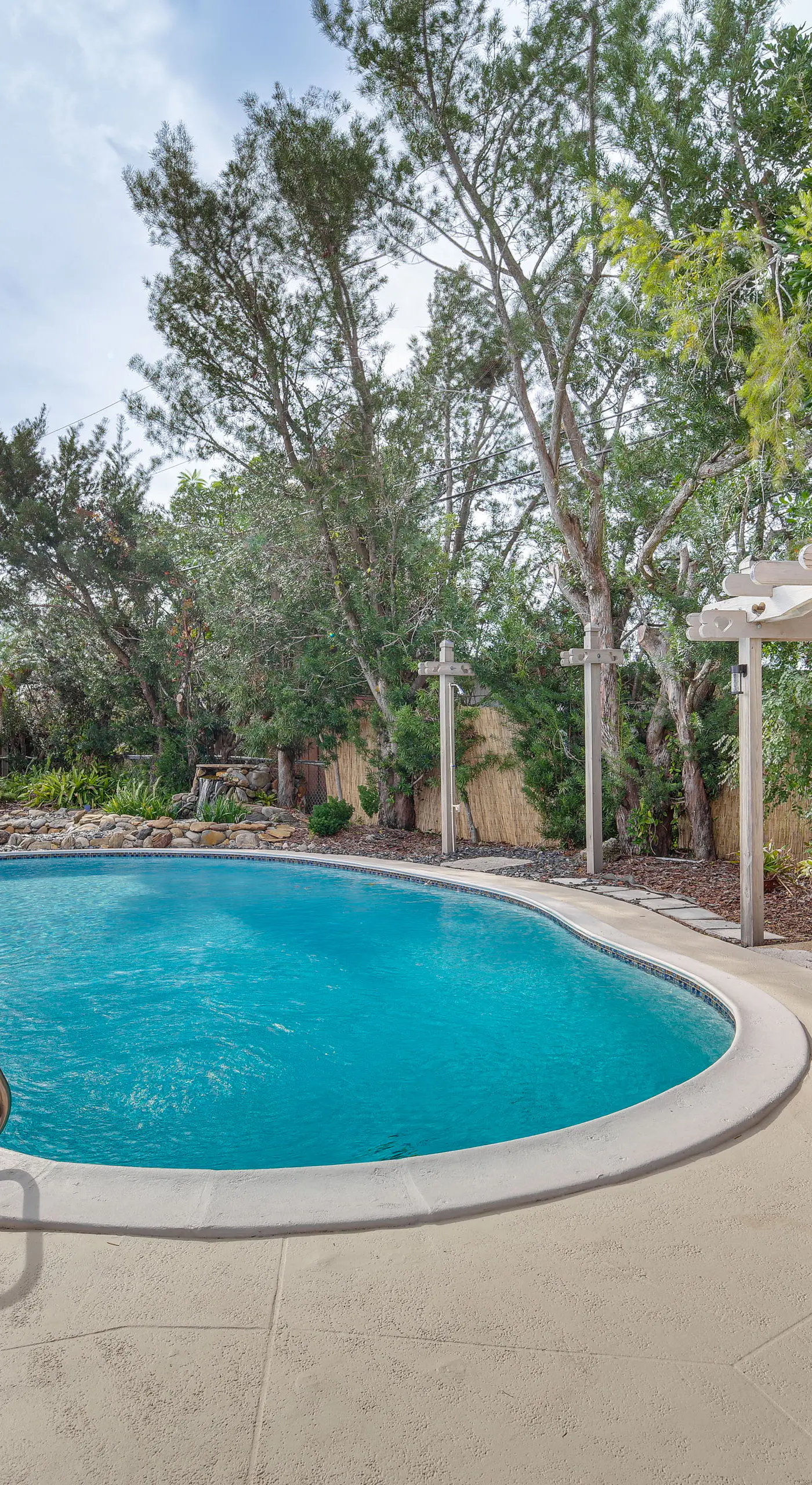 Centrally Located Merritt Island Home: Pool, Porch
