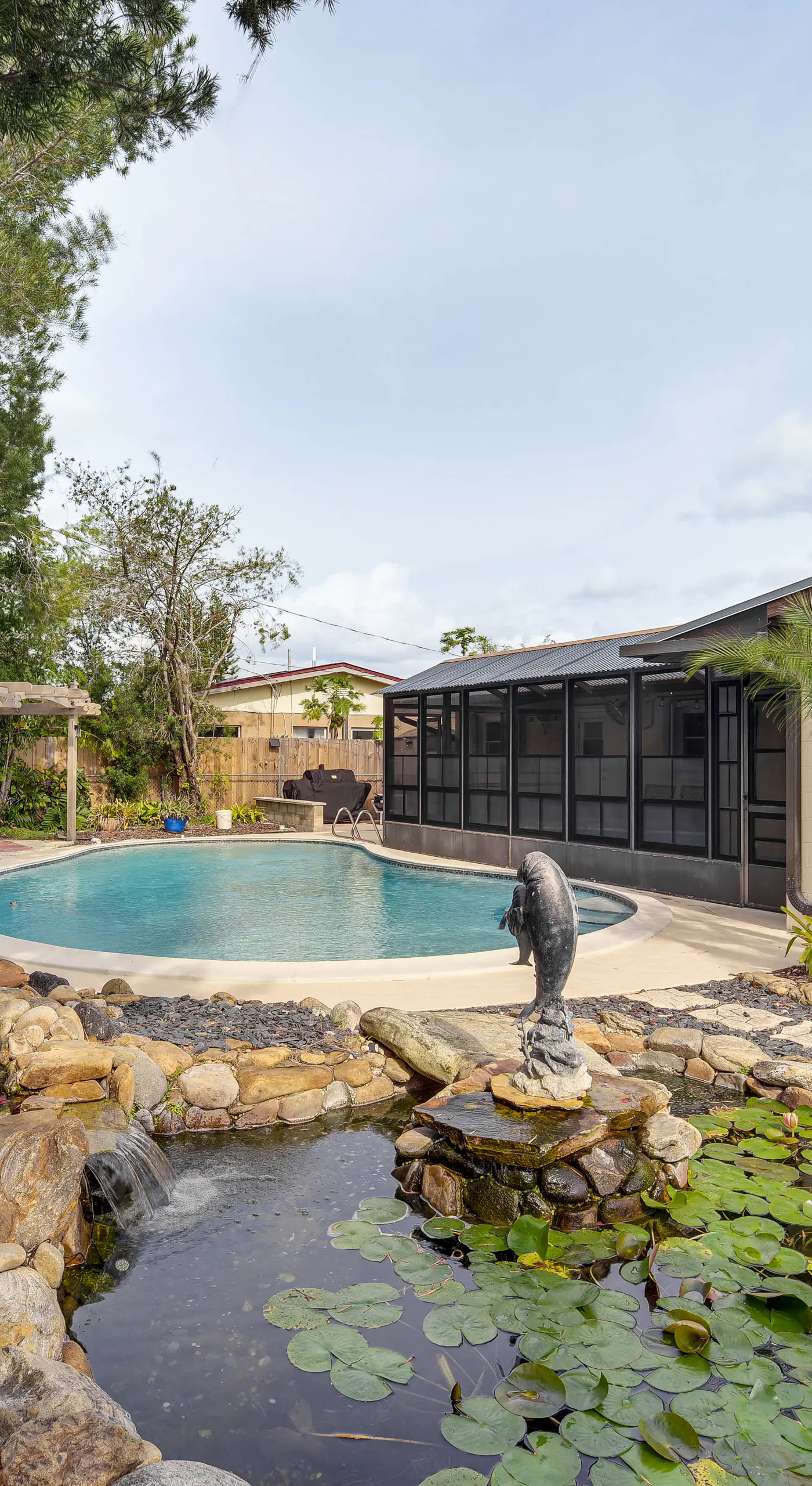 Centrally Located Merritt Island Home: Pool, Porch