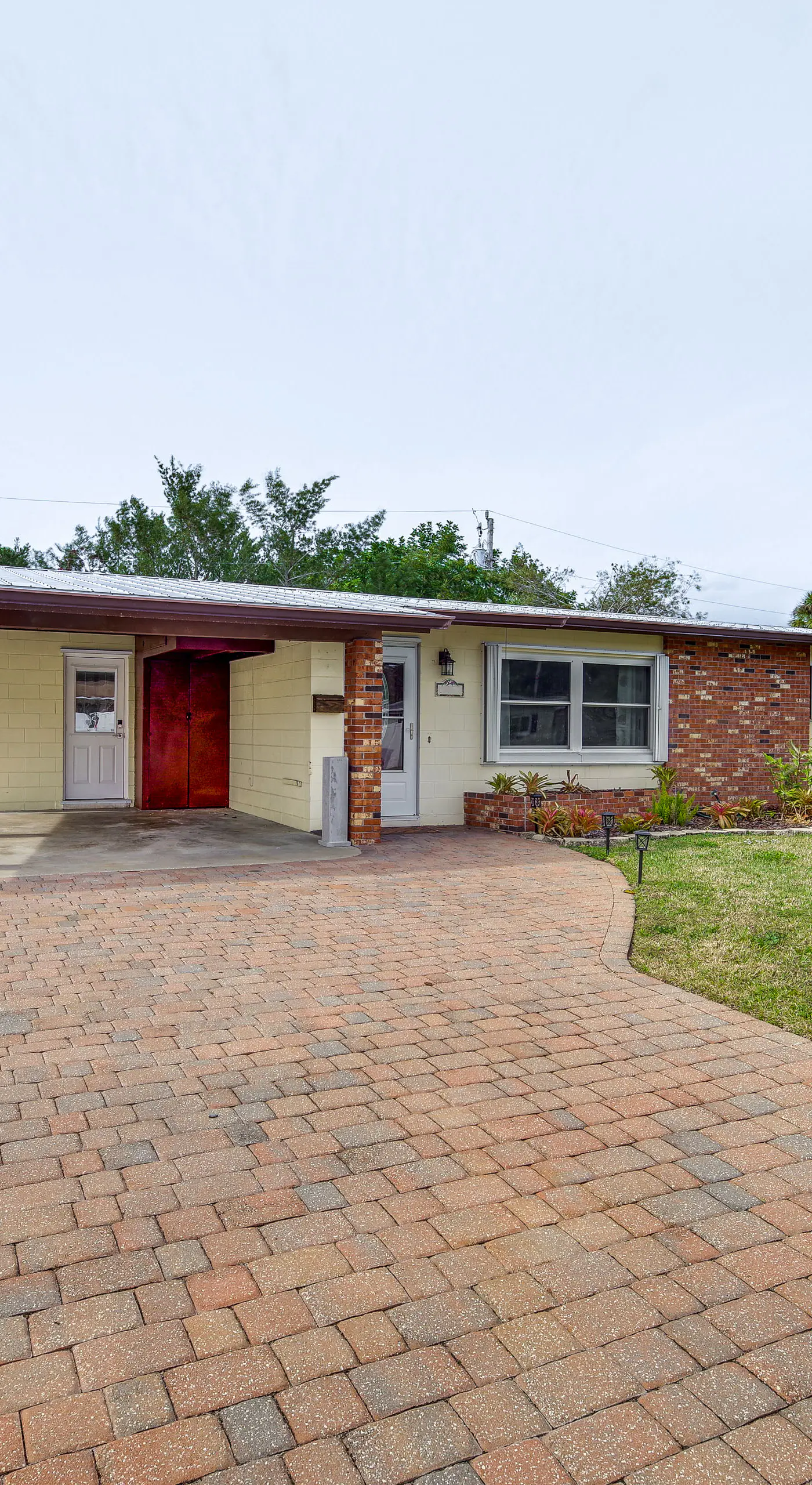 Centrally Located Merritt Island Home: Pool, Porch
