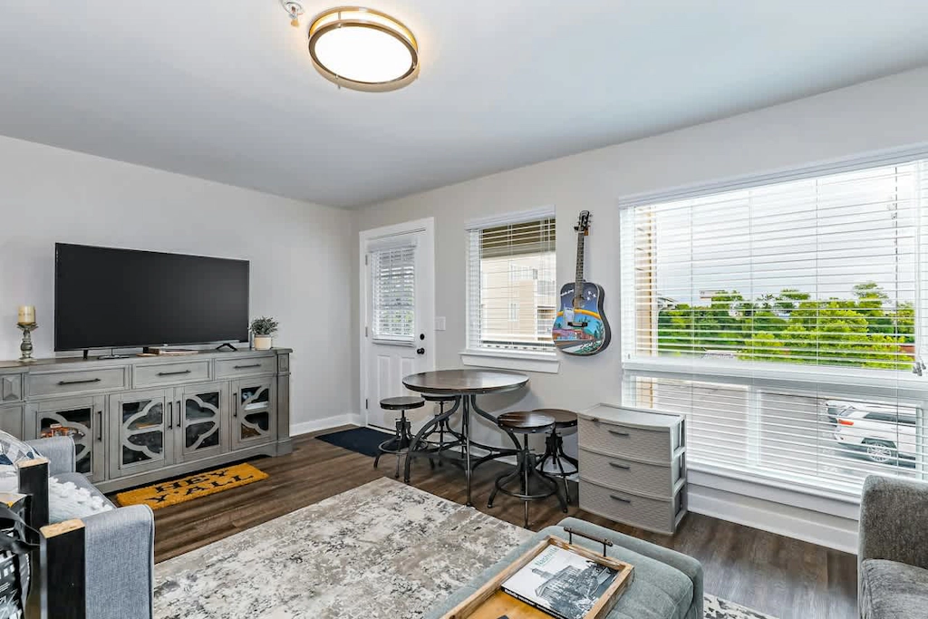 Second-floor condo with partial river view, balcony, & WiFi - great location