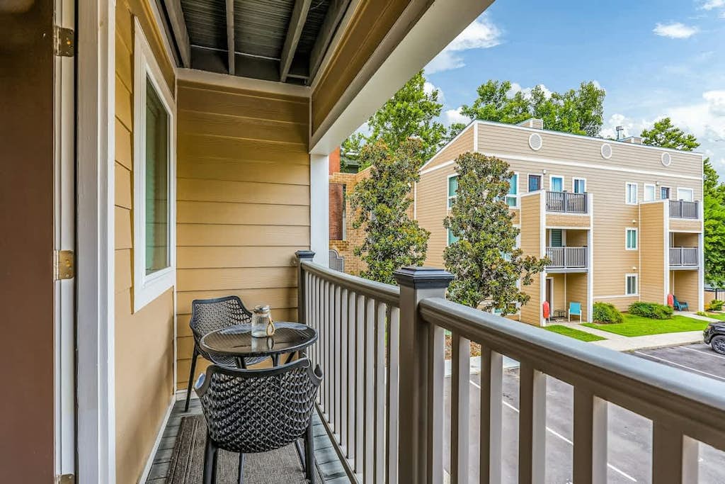 Second-floor condo with partial river view, balcony, & WiFi - great location