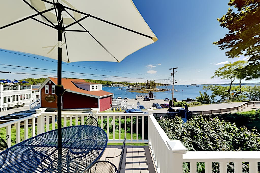 All-suite Boothbay Harbor home with deck, ocean views, and fireplaces