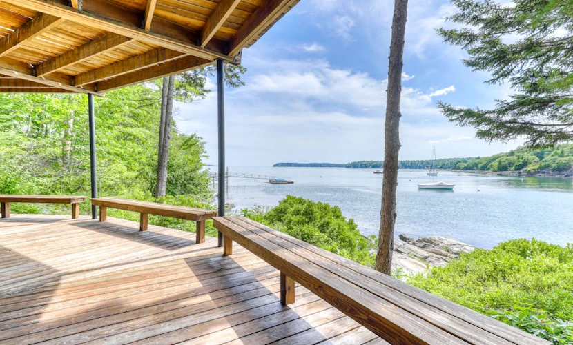 Unique oceanfront home with a deck, tons of natural light, & amazing views
