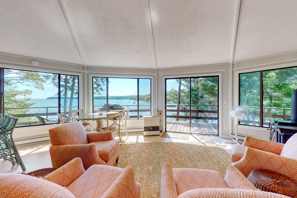 Unique oceanfront home with a deck, tons of natural light, & amazing views