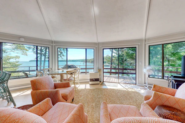 Unique oceanfront home with a deck, tons of natural light, & amazing views