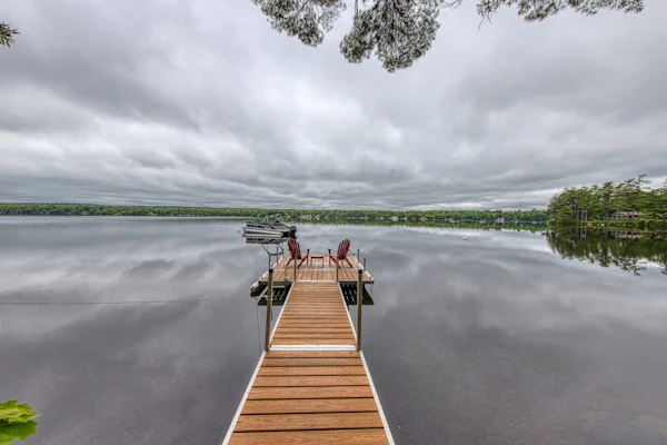 Updated lakefront cottage with shared boat dock - near Acadia