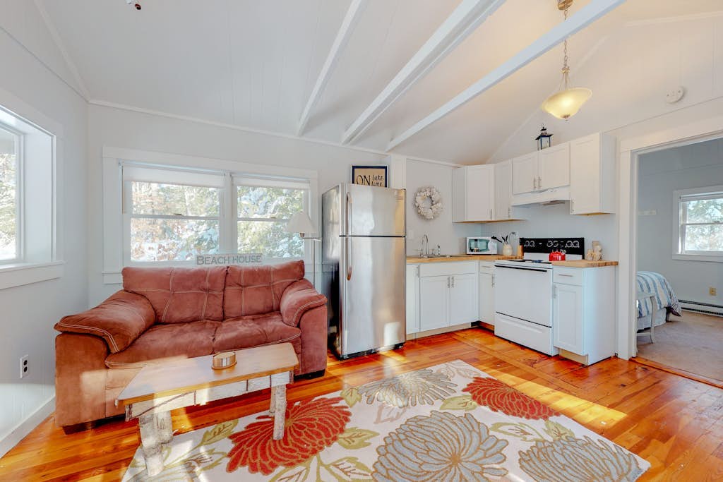 Updated lakefront cottage with shared boat dock - near Acadia