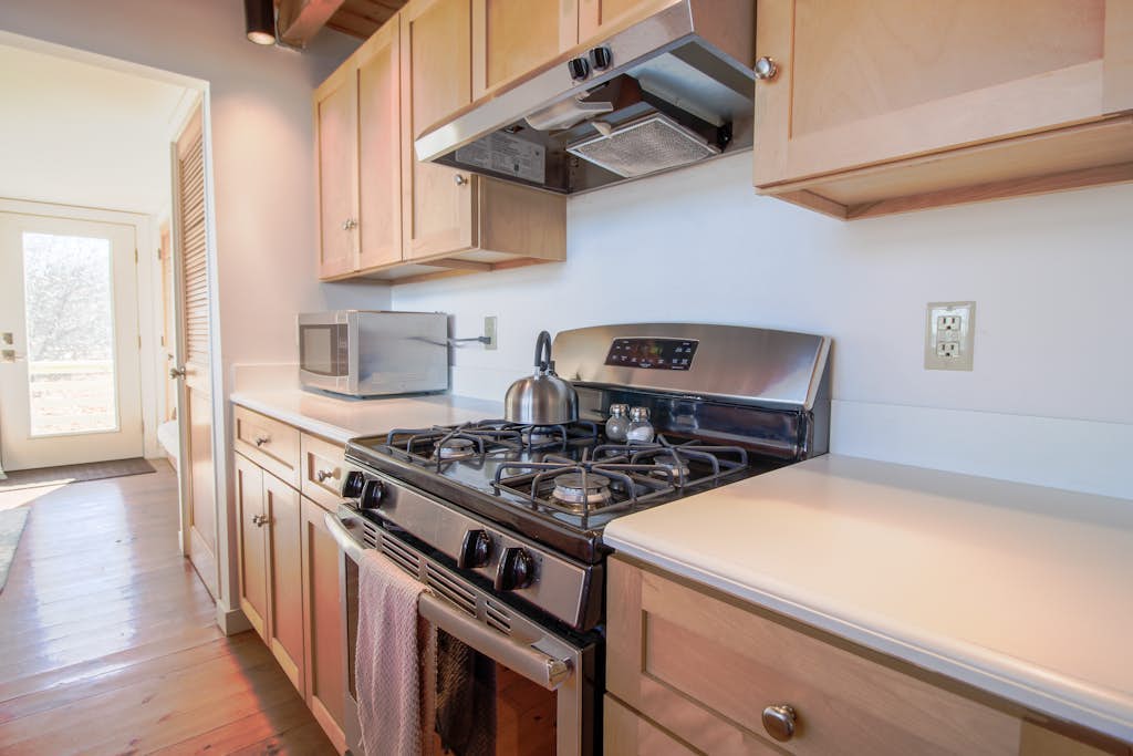 Remodeled Waterfront Home with Wraparound Deck, Water Views, & Beach Access