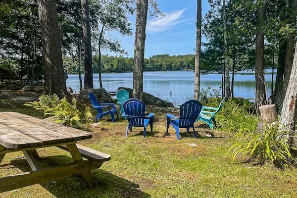 Secluded waterfront home with private dock, outdoor dining, firepit, WiFi & W/D