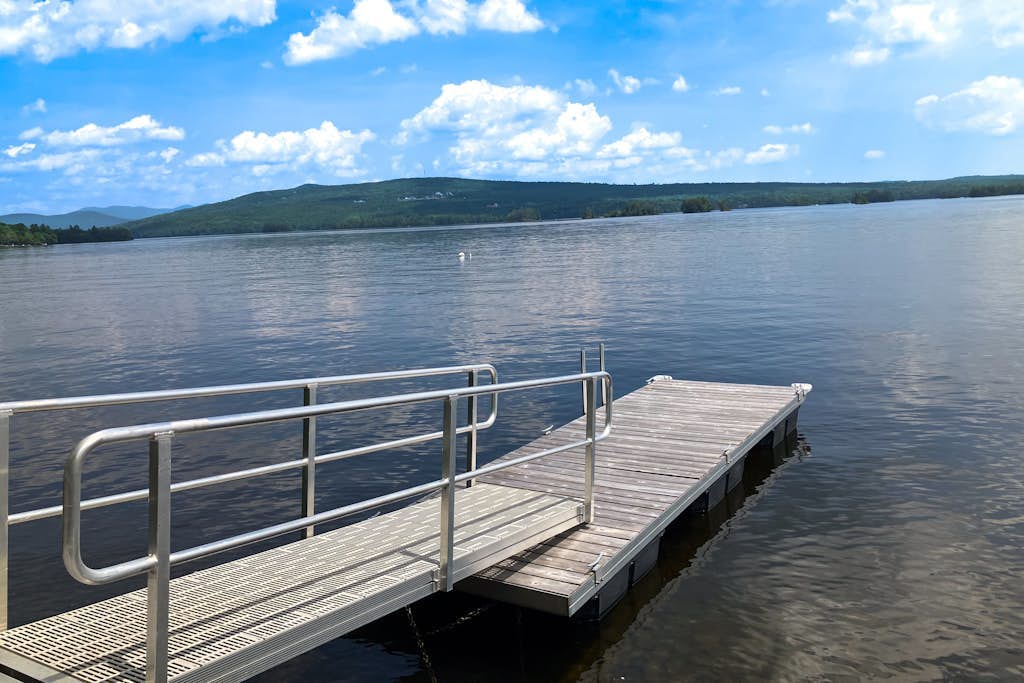 Spectacular lakefront home with dock, firepit, & vaulted ceilings - dog-friendly
