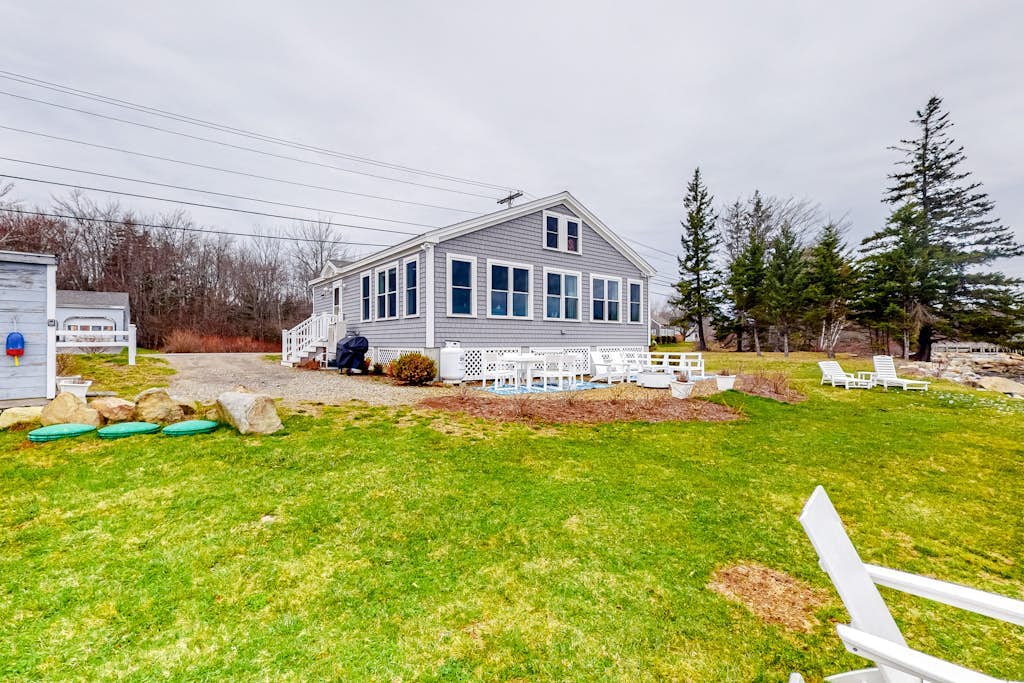 Dazzling ocean-view house with fireplace, deck, firepit, central AC, & W/D