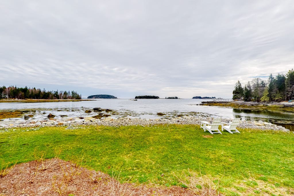 Dazzling ocean-view house with fireplace, deck, firepit, central AC, & W/D