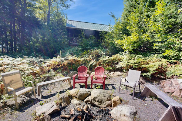 Dog-friendly lakefront home with deck, grill, WiFi, shared dock & water access