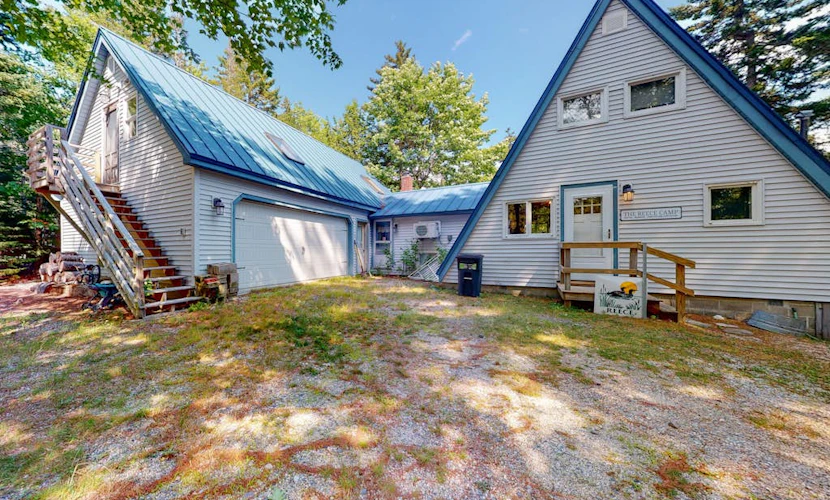 Waterfront A-frame on George’s Pond with views, private dock, beach, kayaks, SUP