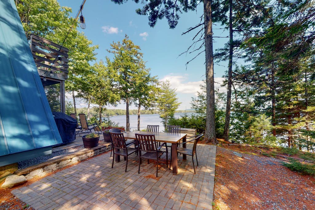 Waterfront A-frame on George’s Pond with views, private dock, beach, kayaks, SUP
