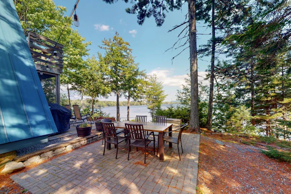 Waterfront A-frame on George’s Pond with views, private dock, beach, kayaks, SUP
