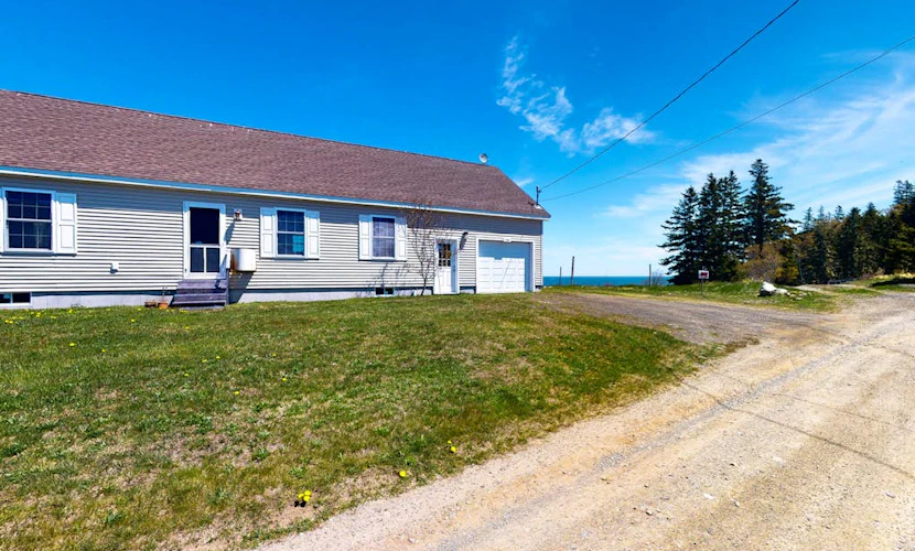 Tranquil getaway on the coast with beach access, ocean views, & screened porch
