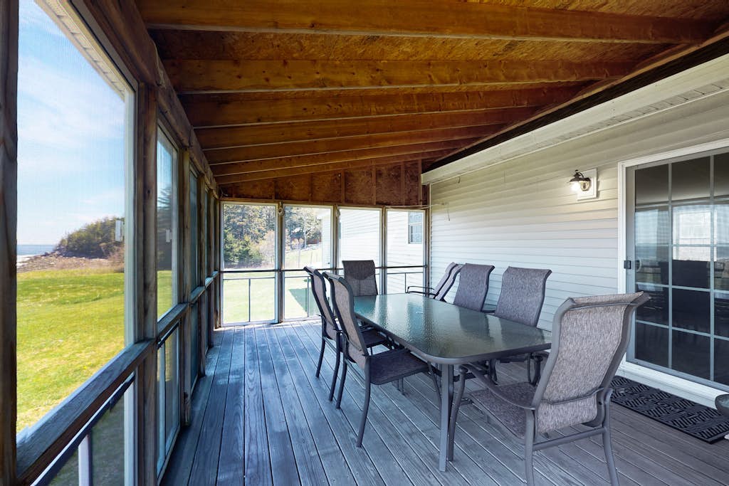 Tranquil getaway on the coast with beach access, ocean views, & screened porch