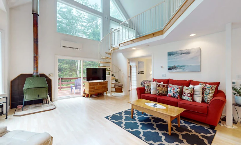 Sunny coastal retreat with deck, grill, beach, dock, & ocean access