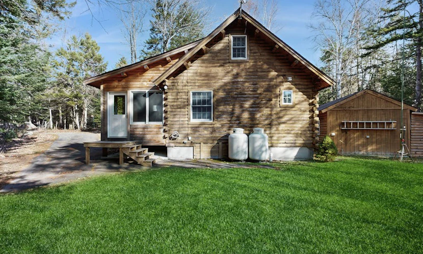 Cozy cabin with covered porch, firepit, grill, fireplace, & washer/dryer