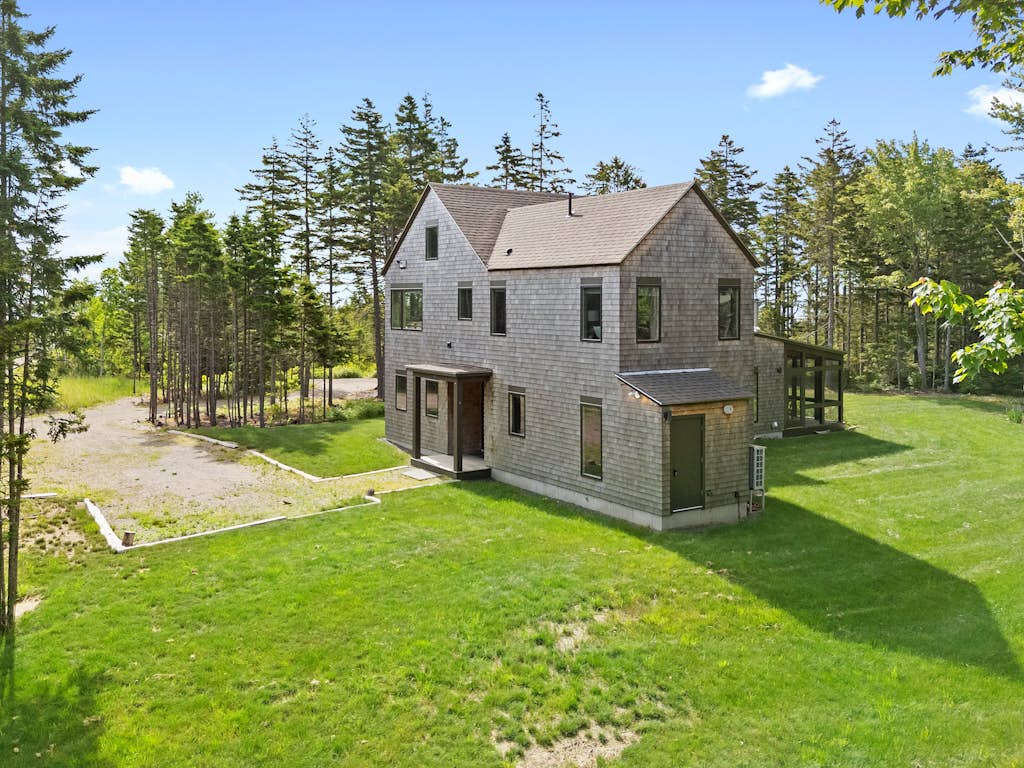 Quiet, modern, dog-friendly home with ocean views, private trails & firepit