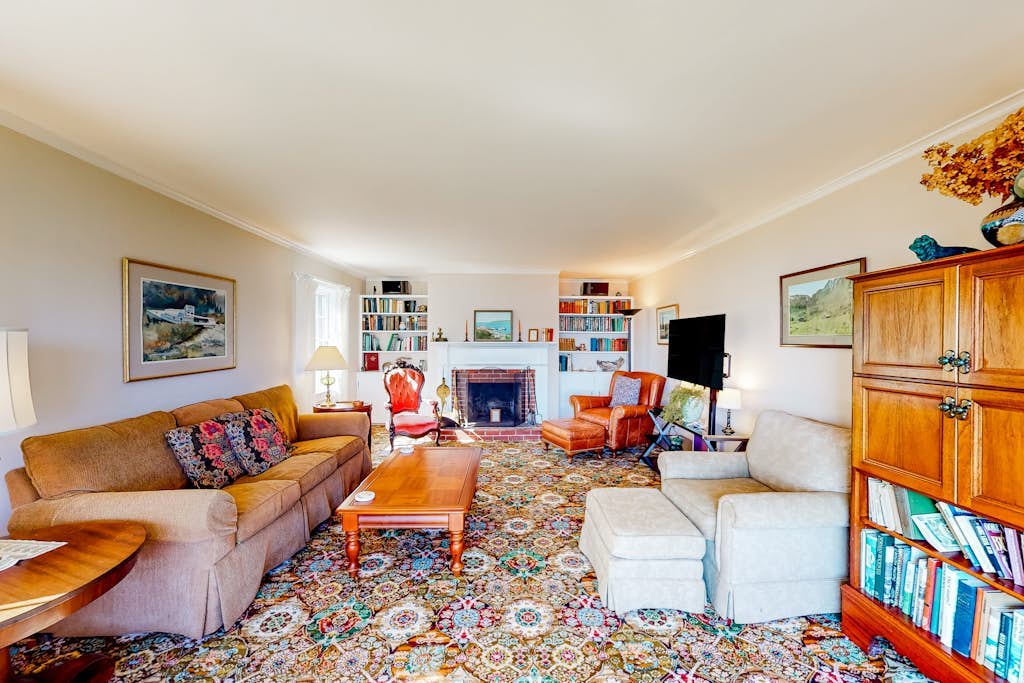 Dog-friendly oceanfront home with private shorefront, two fireplaces, & firepit