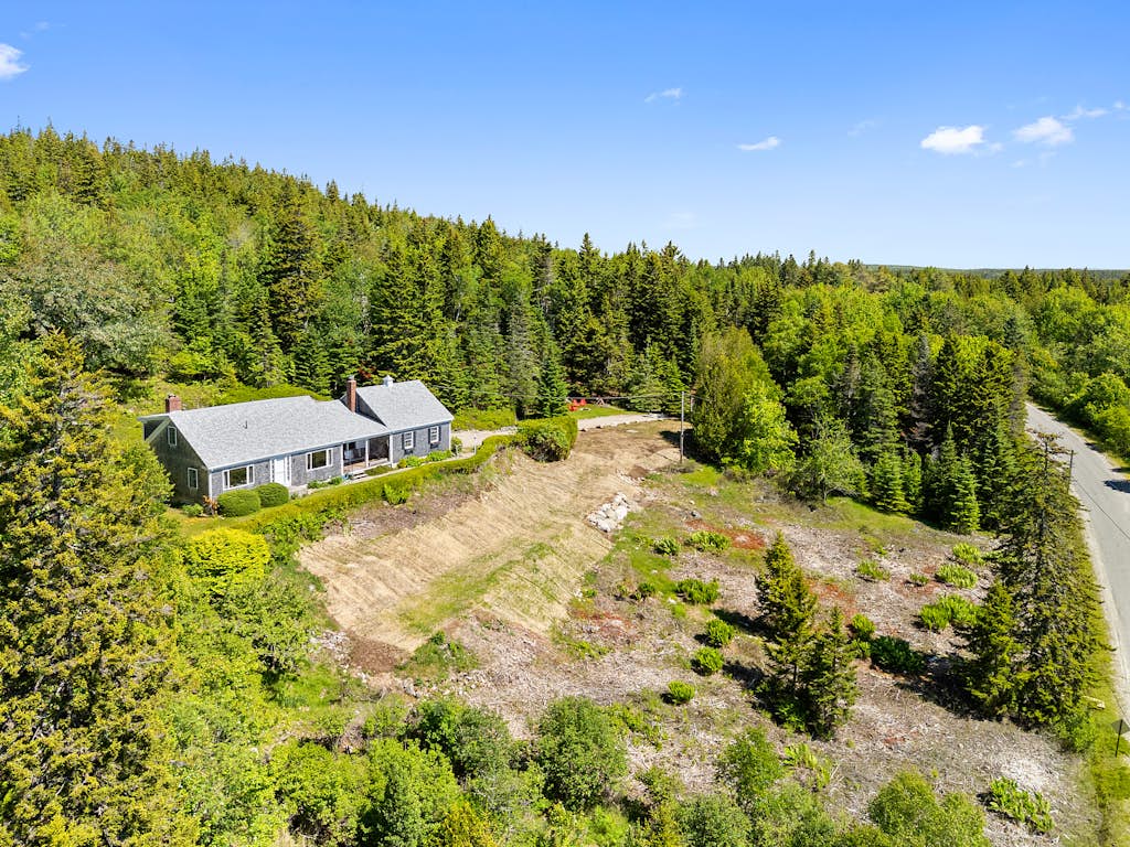 Dog-friendly oceanfront home with private shorefront, two fireplaces, & firepit