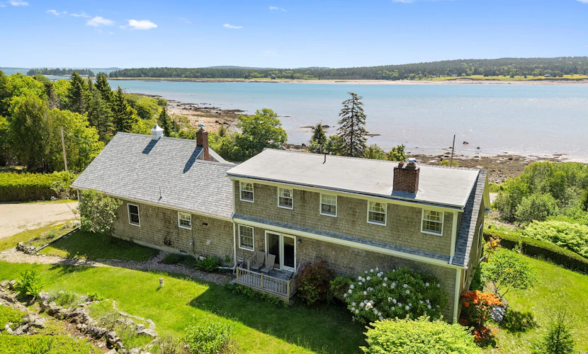 Dog-friendly oceanfront home with private shorefront, two fireplaces, & firepit