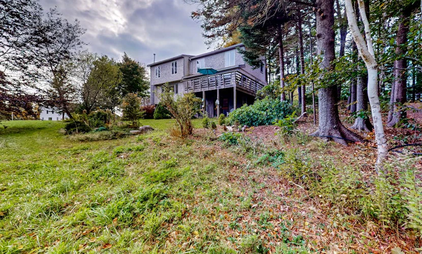 Dog-friendly 3-story home with wood stove, deck, grill, ocean views, W/D, AC