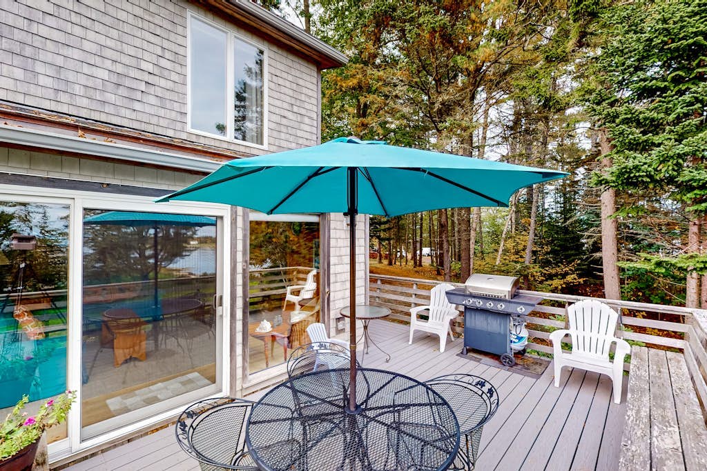 Dog-friendly 3-story home with wood stove, deck, grill, ocean views, W/D, AC