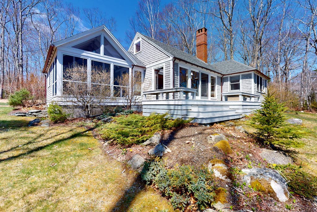 Oceanfront retreat with sunrise views, screened porch, & deck