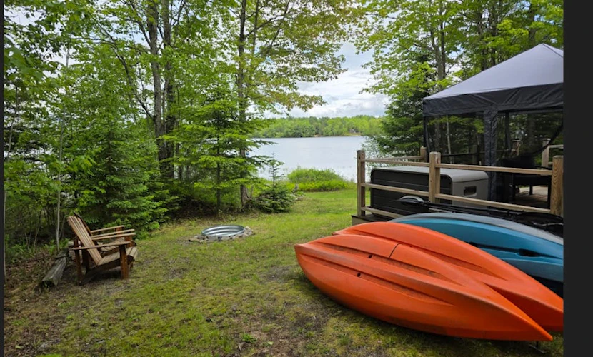 Waterfront home on Graham Lake with kayaks, bikes, firepit & fireplace