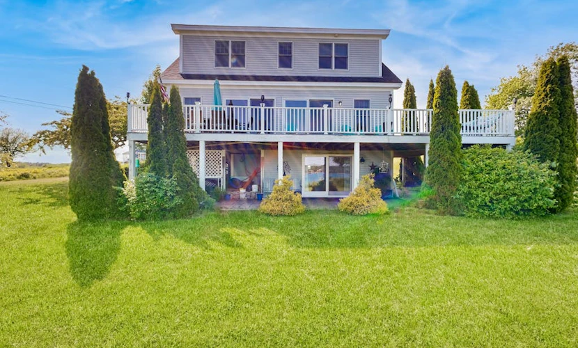 Oceanfront home with dock, beautiful deck & firepit - steps to the beach