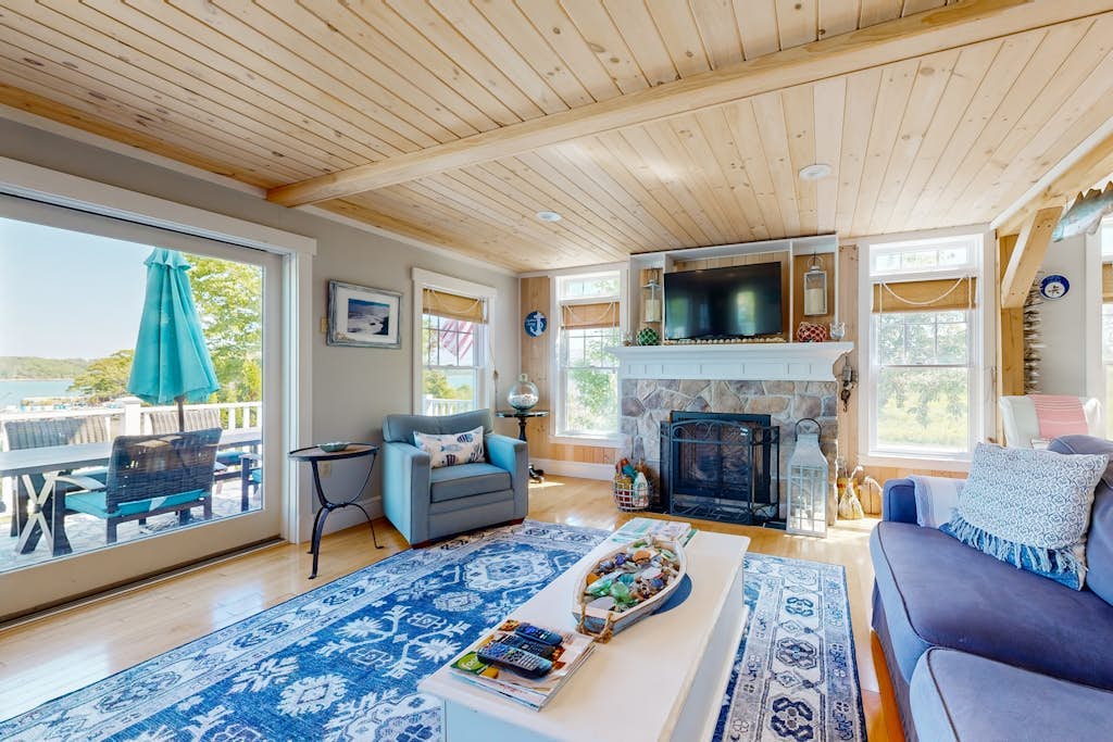Oceanfront home with dock, beautiful deck & firepit - steps to the beach