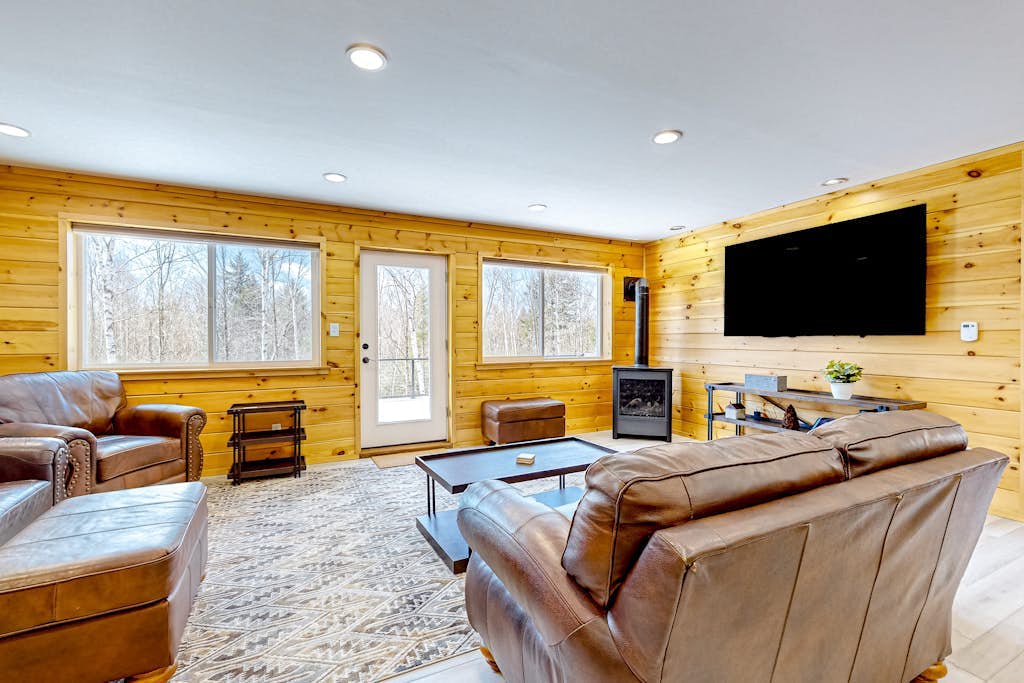 Dog-friendly apartment by Moosehead Lake with sprawling deck & firepit