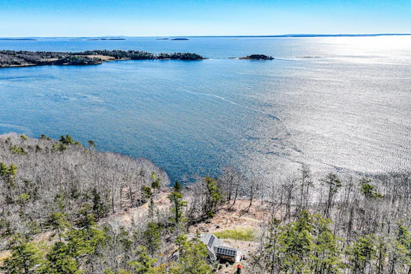 Oceanfront home on 6 acres with multi-level deck & spectacular view