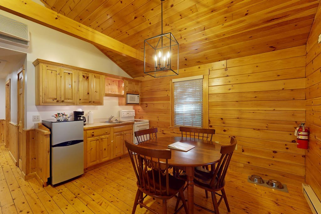 Relax in a two-bedroom cabin with fireplace, AC & access to outdoor adventures