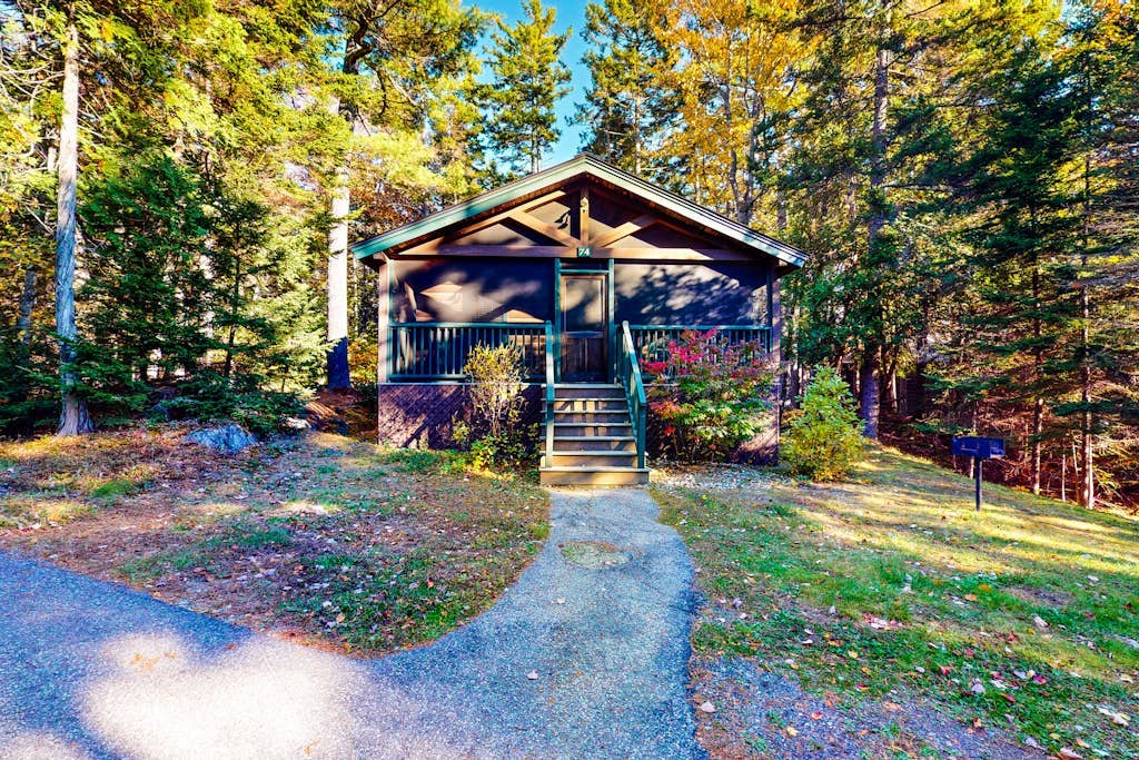 Relax in a two-bedroom cabin with fireplace, AC & access to outdoor adventures