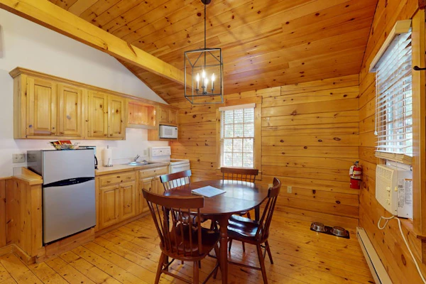 Adventure starts here in this dog-friendly cabin with kitchen, firepit & trails