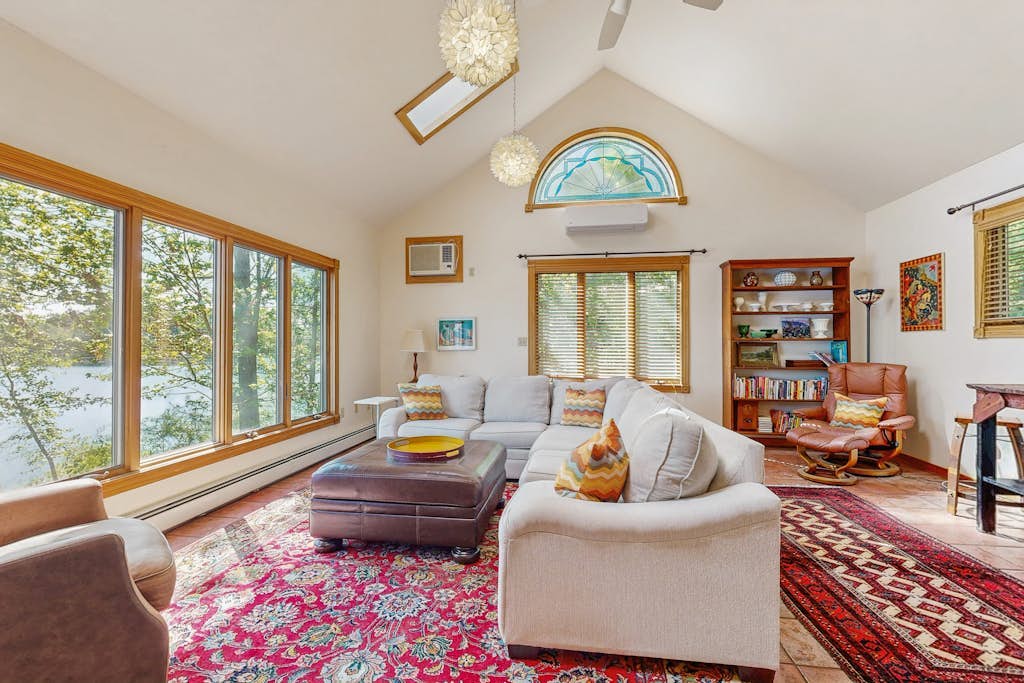 Spacious Lakefront Home with a Sandy Beach, Kayaks, and Stunning Panoramic Views