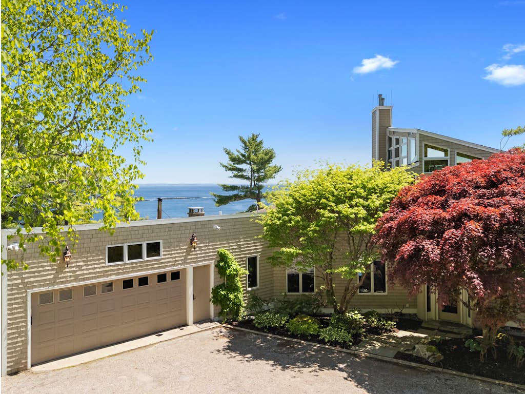 Elegant ocean view home with breathtaking views, private hot tub & large deck