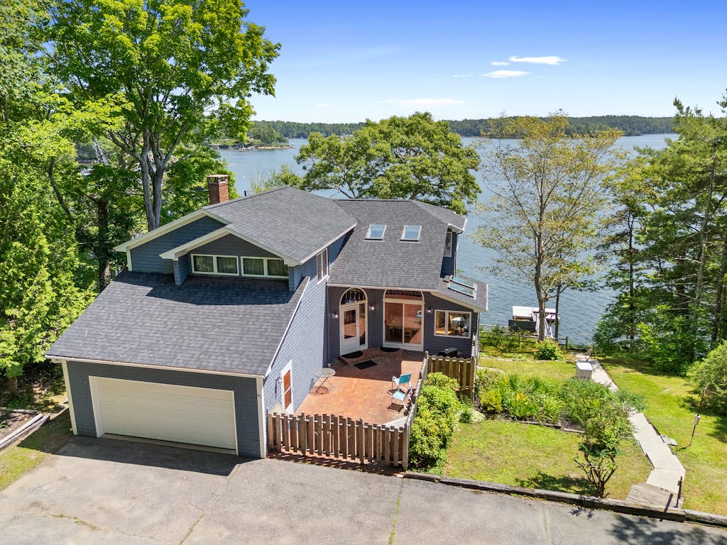 High View- Serene waterfront home w/ a dock, large deck & amazing views!