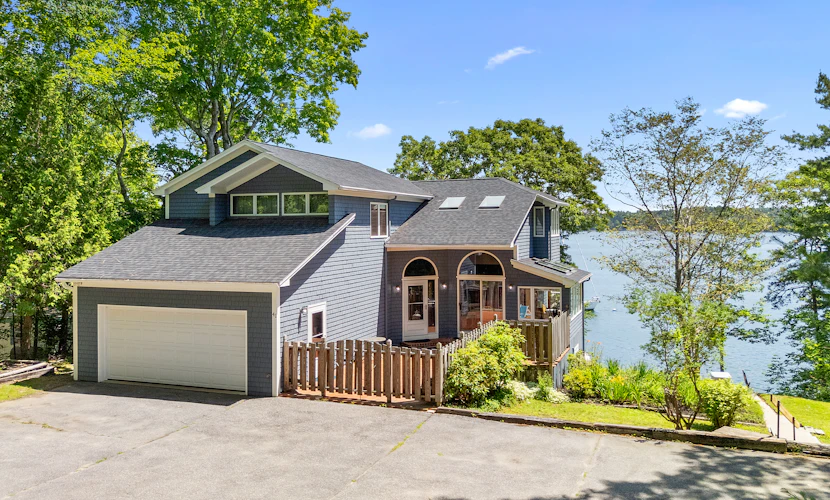 High View- Serene waterfront home w/ a dock, large deck & amazing views!