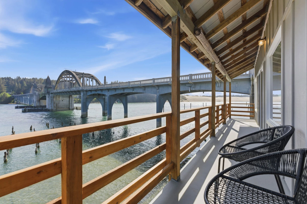 Incredible Riverfront Oasis with Wraparound Deck & Cozy Interior!