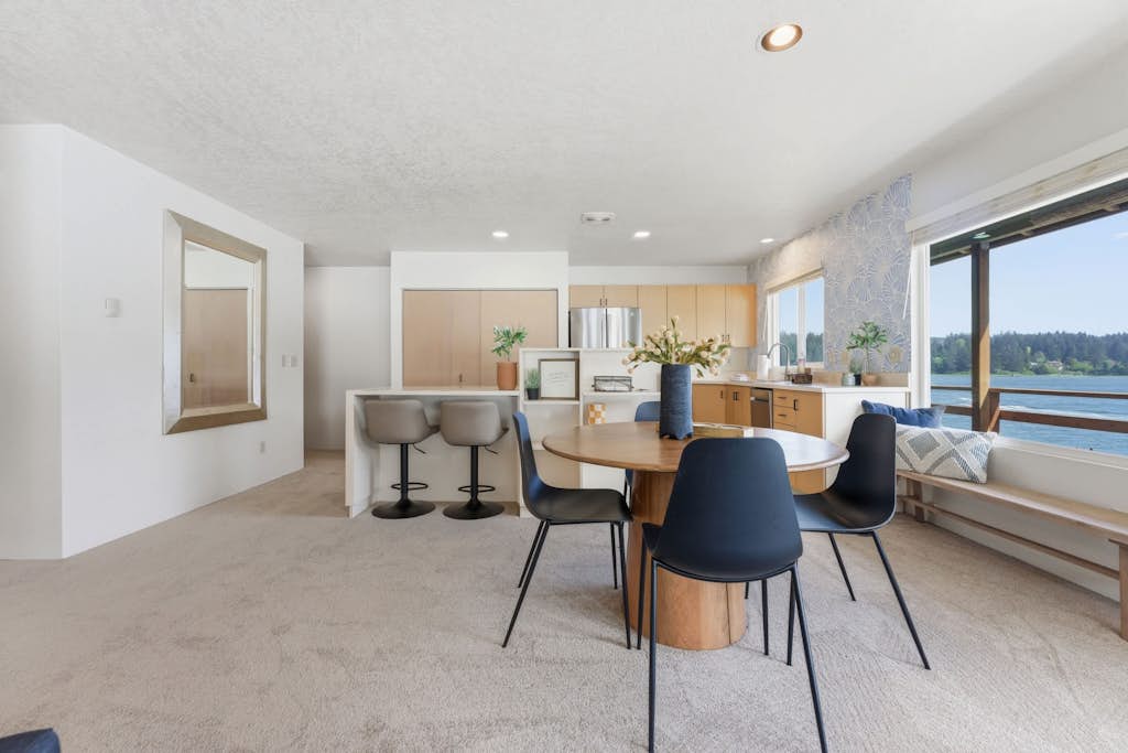 Incredible Riverfront Oasis with Wraparound Deck & Cozy Interior!