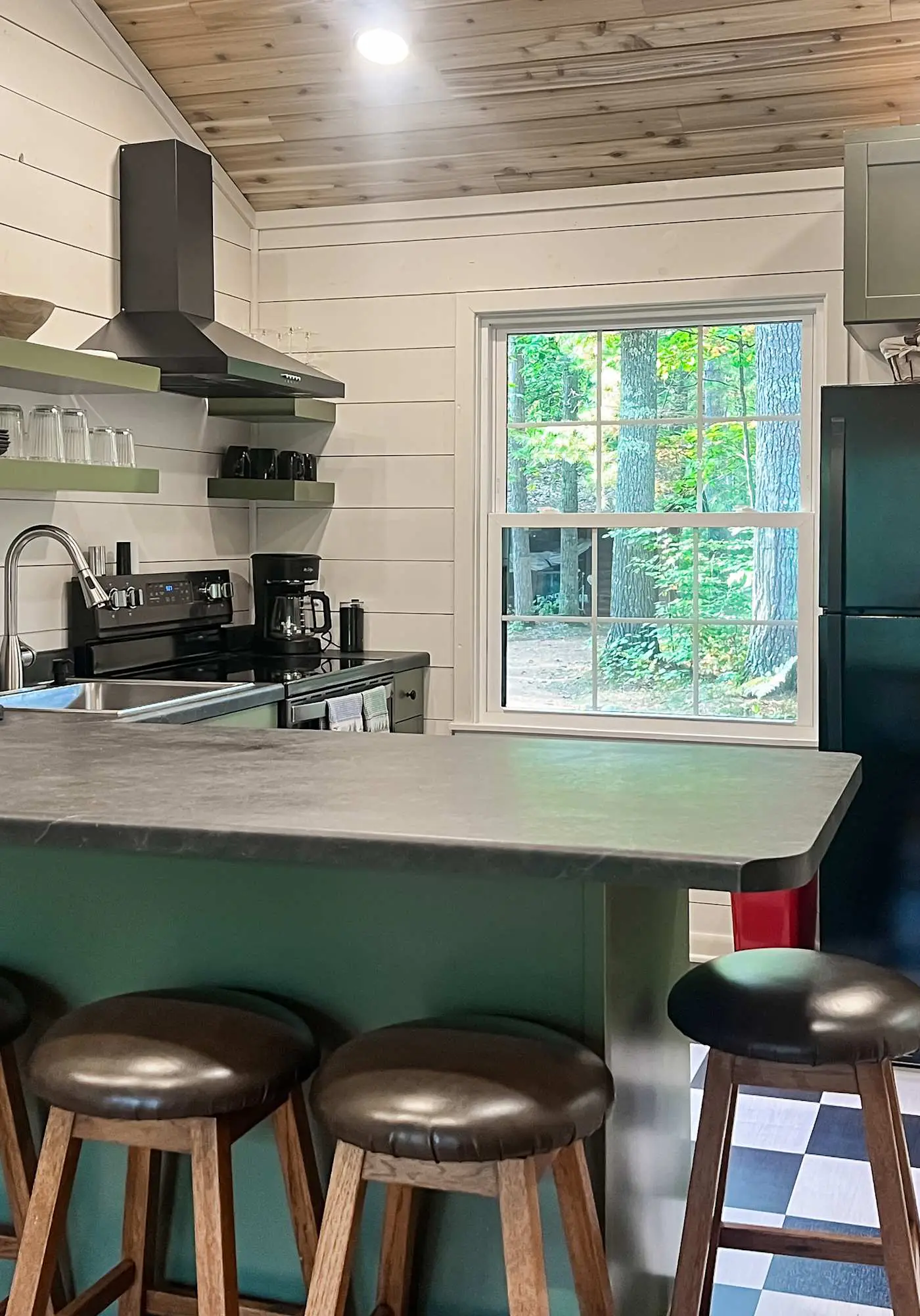 Lakefront escape on Rest Lake with dock, firepit & bike trail access