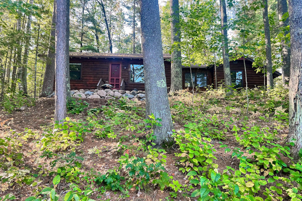 Lakefront escape on Rest Lake with dock, firepit & bike trail access